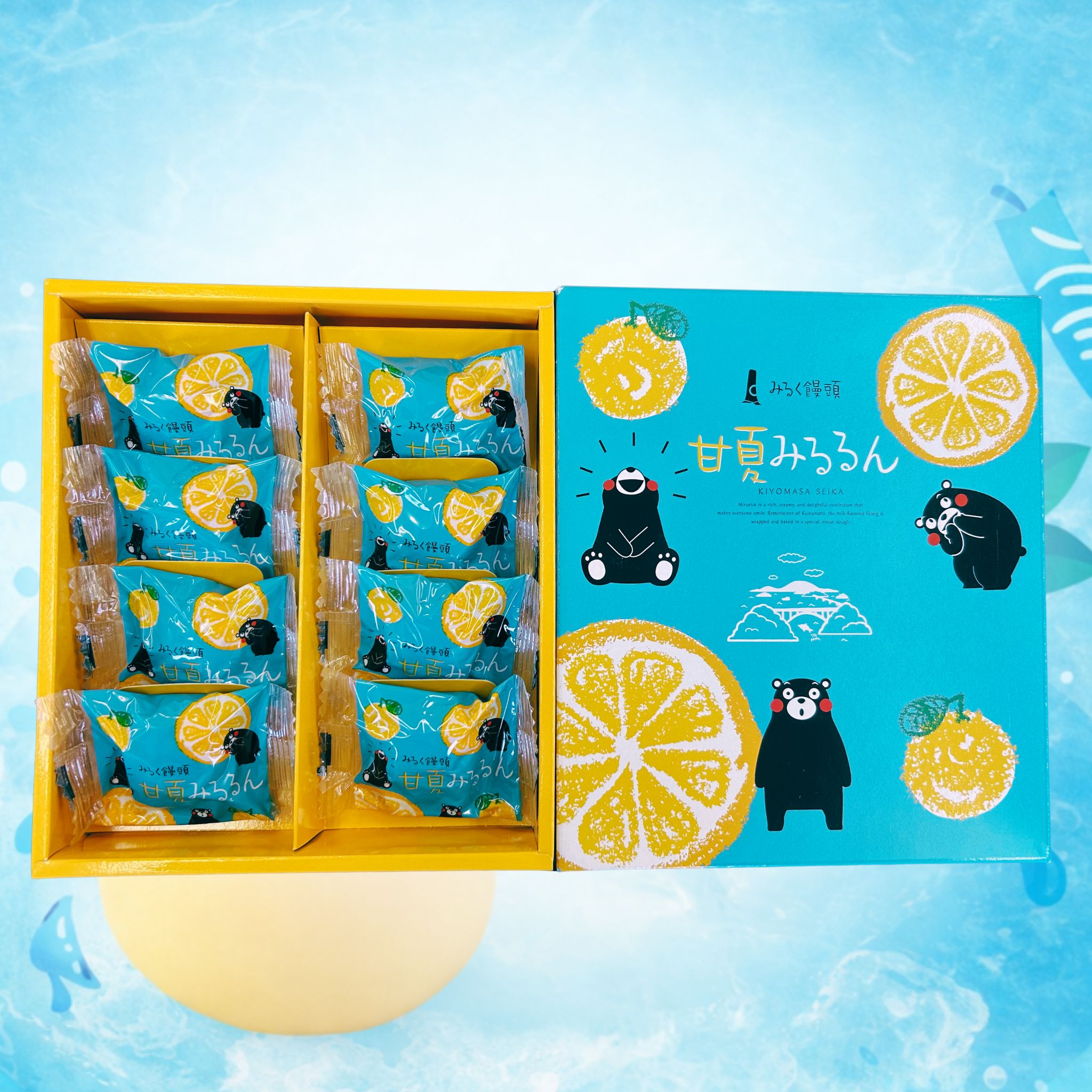 みるく饅頭 甘夏みるるん 8個入り期間限定商品。熊本県産甘夏果汁使用の饅頭とパッケージ画像